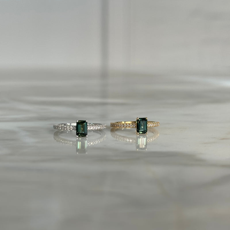 0.65 ct emerald cut green sapphire ring